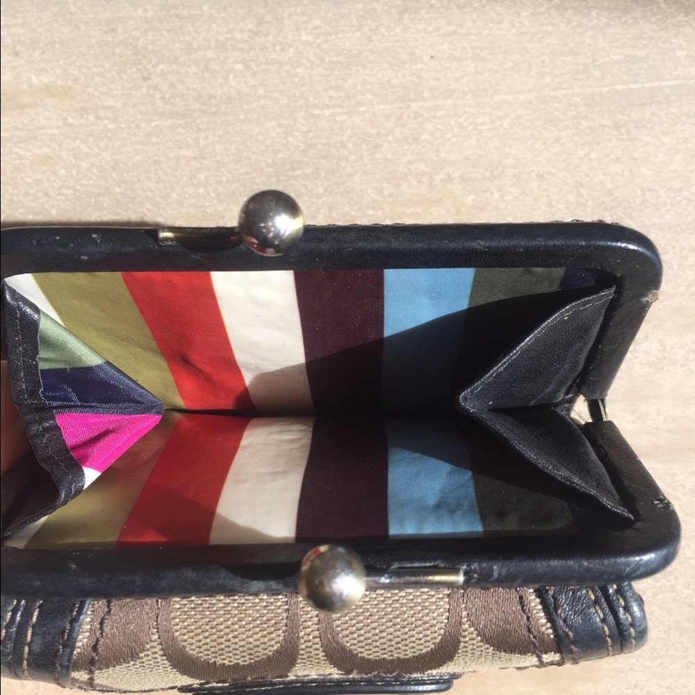 SOLD.   Coach signature Brown 100% authentic
